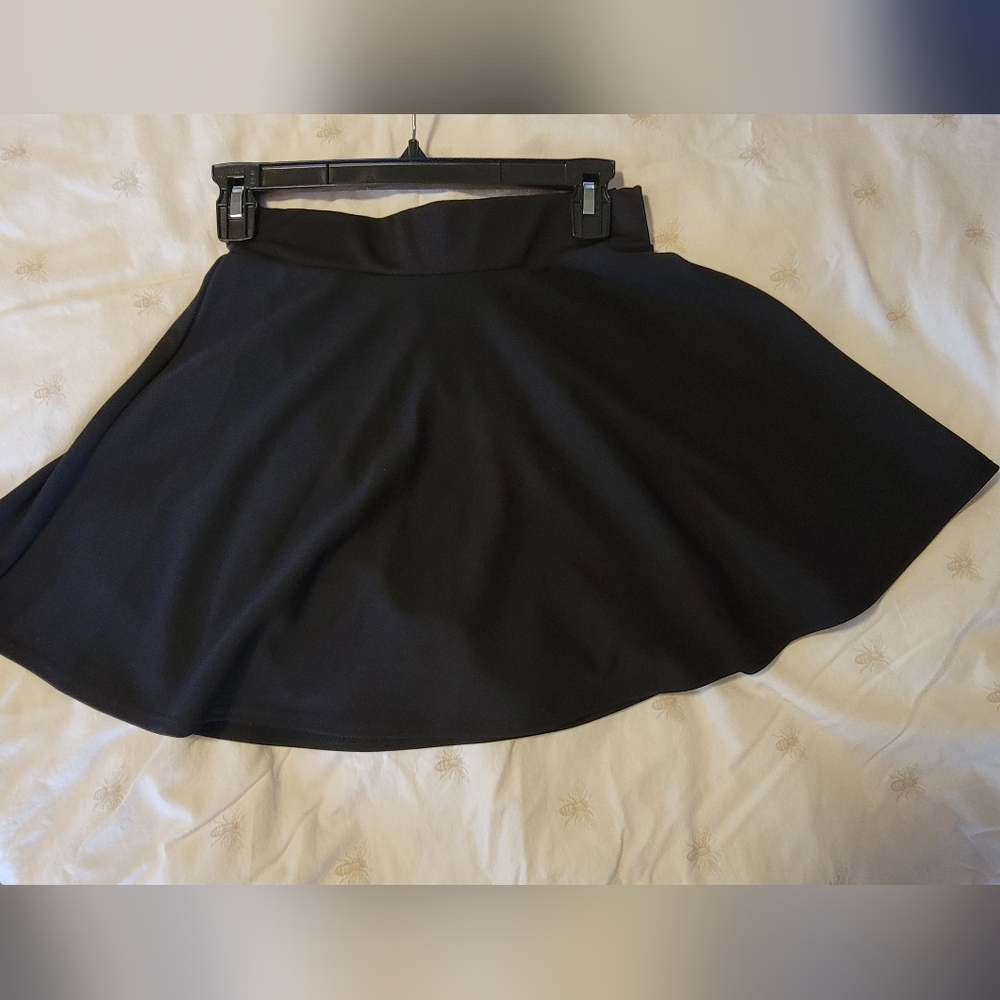 Size medium skater skirt with attached shorts.